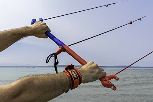 Hands holding a kite surfing control bar over the ocean.